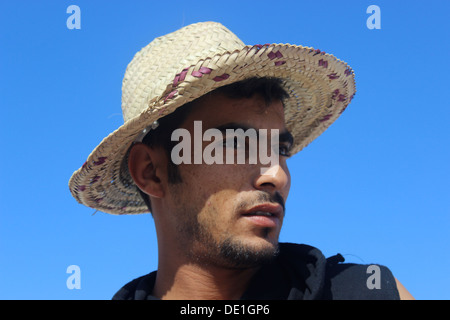 Young Berber with a traditional straw hat (called taraza) Stock Photo