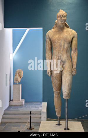 A gigantic Kouros ('young male') statue in the Arcaeological museum of Vathi town, Samos island, Greece Stock Photo