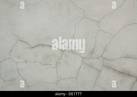 Detail of cracked grunge white wall Stock Photo