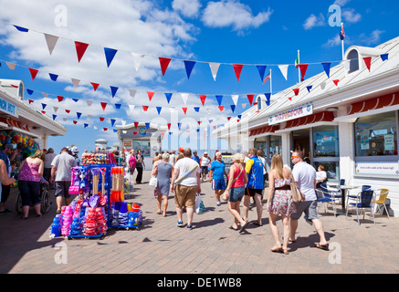 Tourists walking onto Weston Super Mare Grand Pier Weston-Super-Mare Somerset England UK GB EU Europe Stock Photo