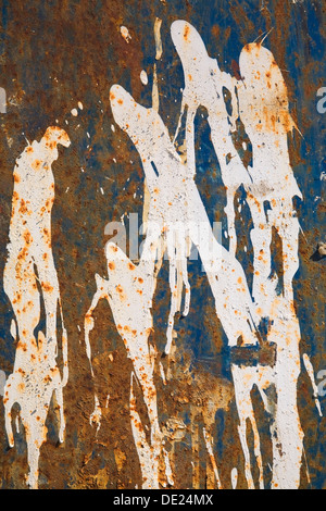 Rust and white paint patterns on a ferrous metal surface, Laval, Quebec Province, Canada Stock Photo