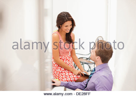 https://l450v.alamy.com/450v/de28ff/man-and-woman-talking-in-office-de28ff.jpg