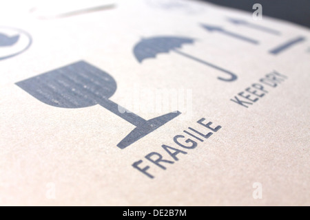'Fragile' sign on cardboard box Stock Photo