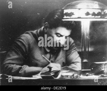Soviet leader Josef Stalin in his Kremlin study, Moscow, USSR, 1935. Artist: Unknown Stock Photo