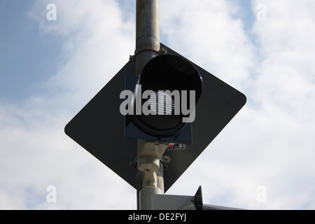 Monitoring camera for red-light violators at a traffic light Stock Photo