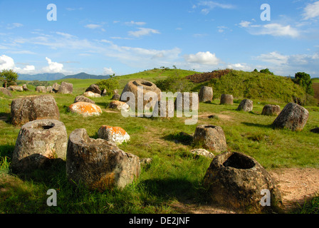 Archeology, ancient large stone jars in the landscape, Jar Site 1, Thong Hai Hin, Plain of Jars, near Phonsavan Stock Photo