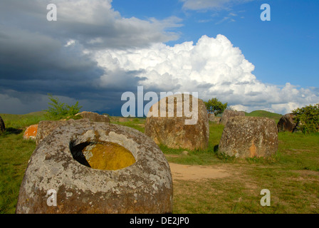 Archeology, ancient large stone jars in the landscape, Jar Site 1, Thong Hai Hin, Plain of Jars, near Phonsavan Stock Photo