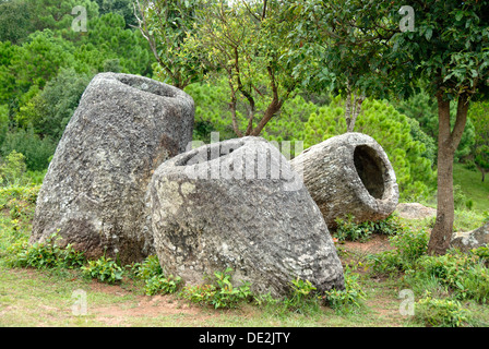 Archeology, three ancient stone jars, Jar Site 2, Hai Hin Phu Salato, Plain of Jars, near Phonsavan, Xieng Khouang province Stock Photo