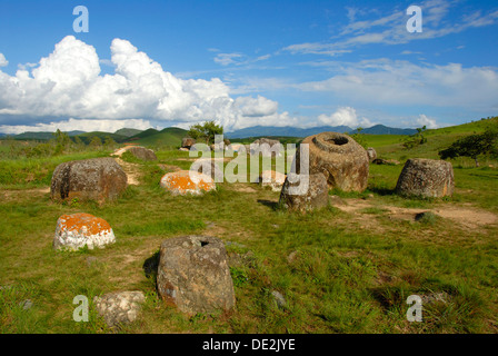 Archeology, ancient large stone jars in the landscape, Jar Site 1, Thong Hai Hin, Plain of Jars, near Phonsavan Stock Photo