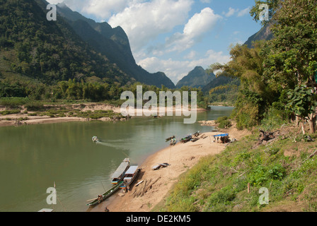 River landscape, boats on the shore, Nam Ou river, Muang Ngoi Kao, Luang Prabang province, Laos, Southeast Asia, Asia