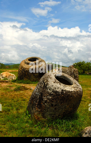 Archeology, ancient stone jars in the landscape, Jar Site 1, Hai Hin Phu Salato, Plain of Jars, near Phonsavan Stock Photo