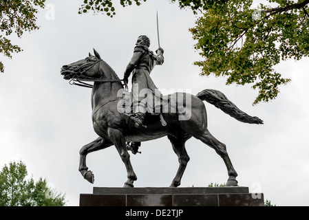 WASHINGTON DC, USA - A large statue of Venezuelan leader Simon Bolivar, by Felix de Weldon, that stands in a park in front of the Interior Department in Foggy Bottom in northwest Washington DC. The statue was installed as a gift of the Venezuelan Government in 1955 and is formally titled Equestrian of Simon Bolivar. Stock Photo