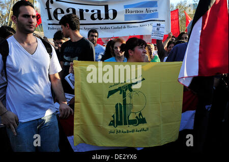 Buenos Aires, Argentina. 10th Sep, 2013. woman carrying a Hizbollah flag manifesting against U.S. invasion to Syria Credit:  Diego Espinosa/Alamy Live News Stock Photo