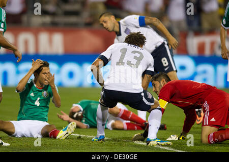 Columbus, Ohio, USA. 10th Sep, 2013. September 10, 2013: Mexico National Team defender Diego Reyes (4) and Mexico National Team goalkeeper Jose de Jesus Corona (1) lay on the ground frustrated after allowing a goal during the U.S. Men's National Team vs. Mexico National Team- World Cup Qualifier match at Columbus Crew Stadium - Columbus, OH. The United States Men's National Team defeated The Mexico National Team 2-0 and clinched a spot for the World Cup in Brazil. Credit:  csm/Alamy Live News Stock Photo