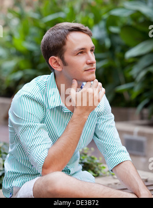 Young Caucasian man in contemplation Stock Photo