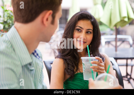 Young happy Caucasian couple looking at each other Stock Photo
