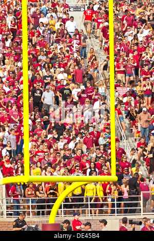 Fans at a college football game Stock Photo