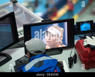 Flycam operator's view of Caroline Wozniacki of Denmark serving at the China Tennis Open in Beijing on 7/10/2011 Stock Photo