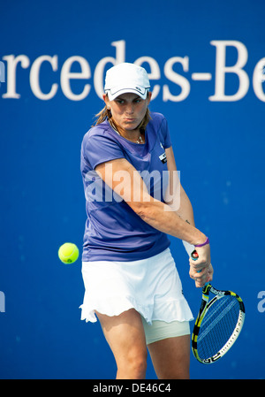 Romina Oprandi of Switzerland plays Camila Giorgi of Italy at the China Open Tennis tournament in Beijing on 2/10/2012 Stock Photo