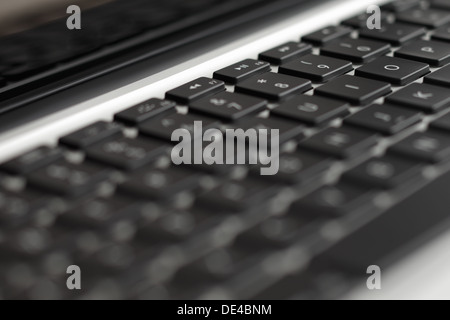 A close-up of a keyboard of a beautifully designed modern laptop computer Stock Photo