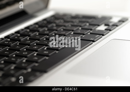 A close-up of a keyboard of a beautifully designed modern laptop computer Stock Photo