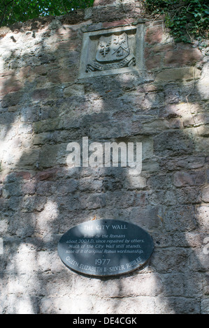 Slate plaque commemorating QE silver Jubilee on the city wall Exeter, Devon, England, UK Stock Photo