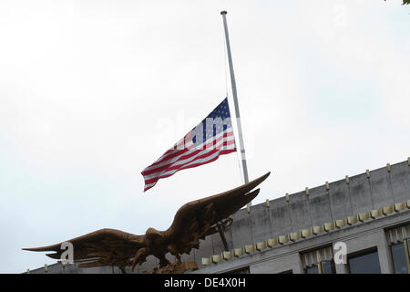 London, UK. 11th Sep, 2013. The American flag flies at half mast  from the US embassy in London to mark the 12th anniversary of the 9/11 terrorist attack on September 2001 in New York and Washington DC Credit:  amer ghazzal/Alamy Live News Stock Photo