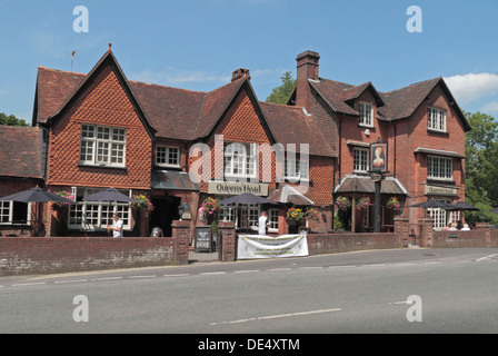 The Queens Head public house and restaurant in the village centre of Burley, New Forest, Hampshire, UK. Stock Photo