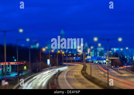 View towards Frankfurt from the A 661 motorway, looking towards Messeturm tower and the Frankfurt Messe Trade Fair, tilt-shift Stock Photo