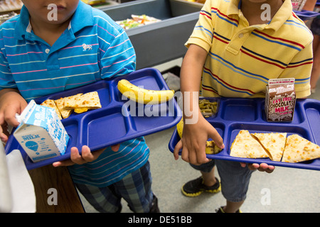 Students in line at an elementary school cafeteria. Stock Photo