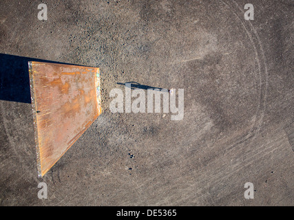 Sculpture 'Bramme' on an artificial hill, a stockpile. 20 Meters high steel slab. Essen, Germany. Stock Photo