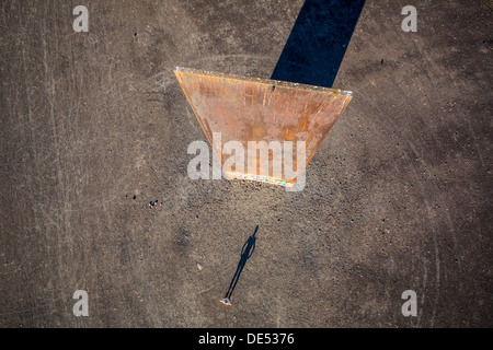 Sculpture 'Bramme' on an artificial hill, a stockpile. 20 Meters high steel slab. Essen, Germany. Stock Photo