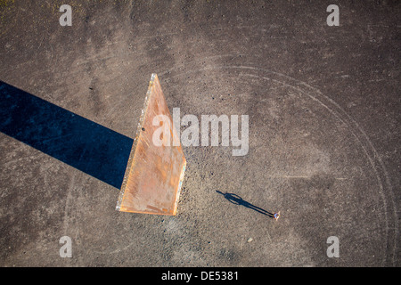 Sculpture 'Bramme' on an artificial hill, a stockpile. 20 Meters high steel slab. Essen, Germany. Stock Photo