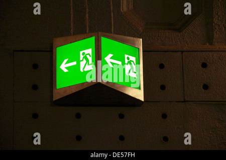 Emergency exit sign, illuminated pictograms, green, fire prevention, evacuation route Stock Photo