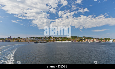 View from the back of the ferry, leaving Port Townsend waterfront on a summer day. Stock Photo