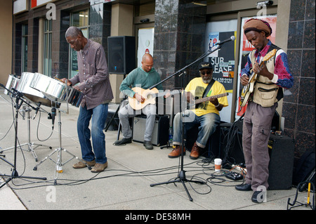 Caribbean musical band performing on the street, Vancouver, BC, Canada