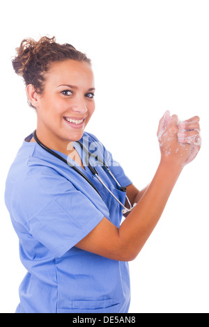 young nurse washing hands with soap isolated Stock Photo