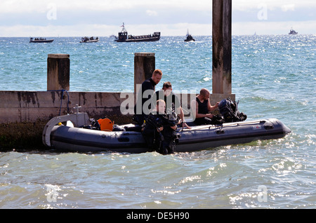 Royal Navy frogmen taking part in an armed forces display during Bournemouth Air Festival 2013. Stock Photo