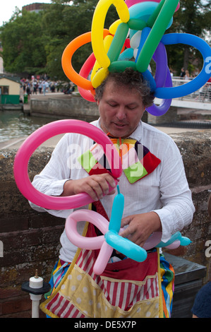 Man modelling balloons Stock Photo