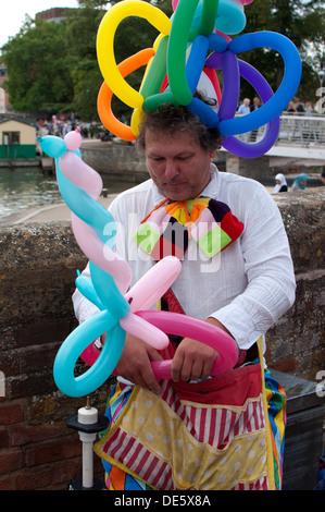 Man modelling balloons Stock Photo