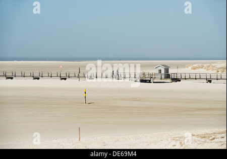 Sankt Peter- Ording, Germany, boardwalks and tourists on the beach of St. Peter- Ording Stock Photo