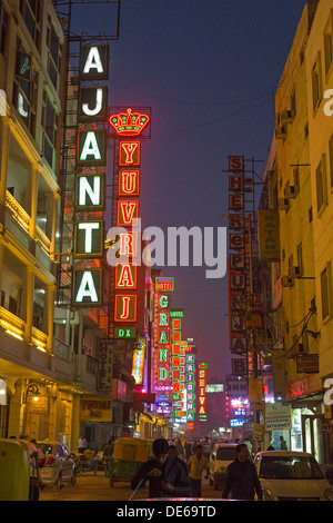 India, Uttar Pradesh, Delhi, budget hotels in the Paharganj district illuminated at twilight Stock Photo