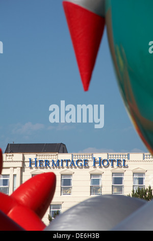 Hermitage Hotel with part of the exterior of the Amococo Luminarium at Bournemouth in September Stock Photo