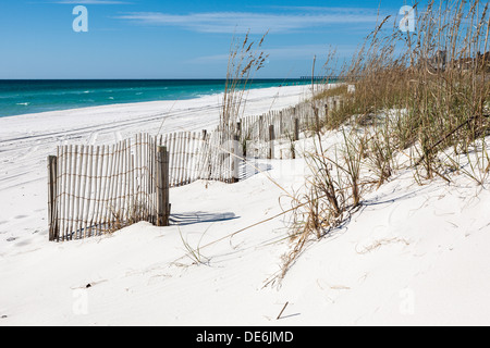 Erosion control fencing and sea grass protect the white sand beaches of Gulf Breeze, Florida Stock Photo