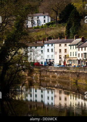 Shops and houses on South Parade next to the River Derwent in Matlock Bath a spa resort in Derbyshire Peak District England UK Stock Photo