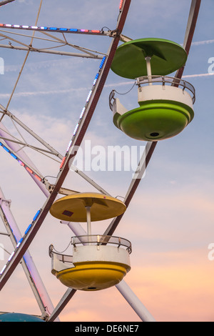 Lighted Ferris Wheel ride at sunset on infield of Daytona International Speedway in Daytona, Florida, USA Stock Photo