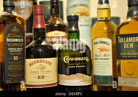Bottles of Irish whiskey. From left, Bushmills, Redbrest, Kilbeggan, Connemara, Tyrconnell and Tullamore Dew. Stock Photo