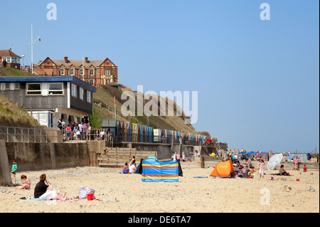 People enjoying a sunny may bank holiday weekend on Mundesley Beach, Norfolk Coast England UK Stock Photo