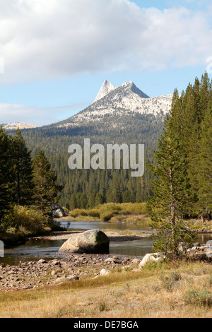 The Tuolumne river flowing through Tuolumne Meadows with Cathedral peak in the background in Yosemite National Park high country Stock Photo