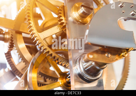 gears and mainspring in the mechanism of a pocket watch Stock Photo